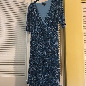Beautiful dress size 12 women's V neck gathered at left side of waist..